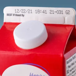 Máy in phun date Videojet 1880 8 cij dairy milk coated cardboard